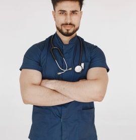 International medical student. Man in a blue uniform. Doctor with stethoscope.